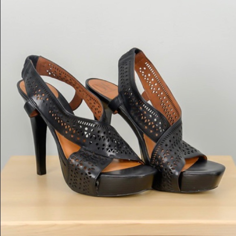 Diane Von Furstenberg black leather platform heel.
